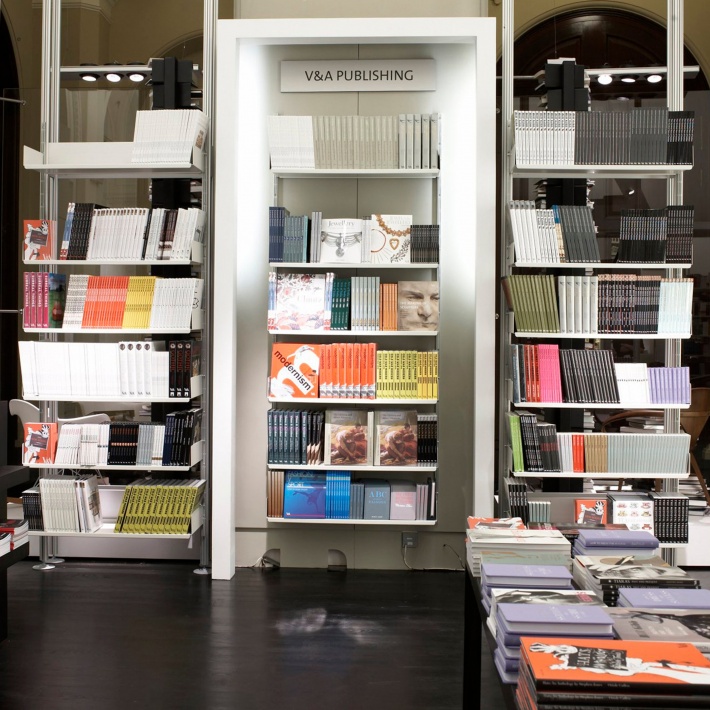 Both wall-mounted (centre) and compressed shelving systems (left and right) accommodate large numbers of books in London’s, V&A bookshopImages courtesy of the V&A/Holly Jolliffe
