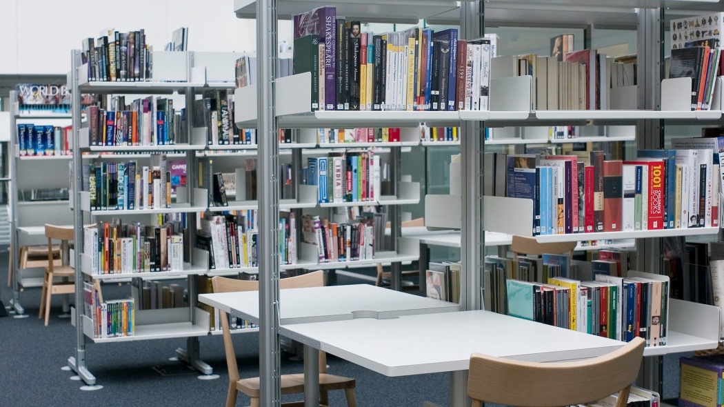 Study areas were created within the library by adding desks directly to the shelving system