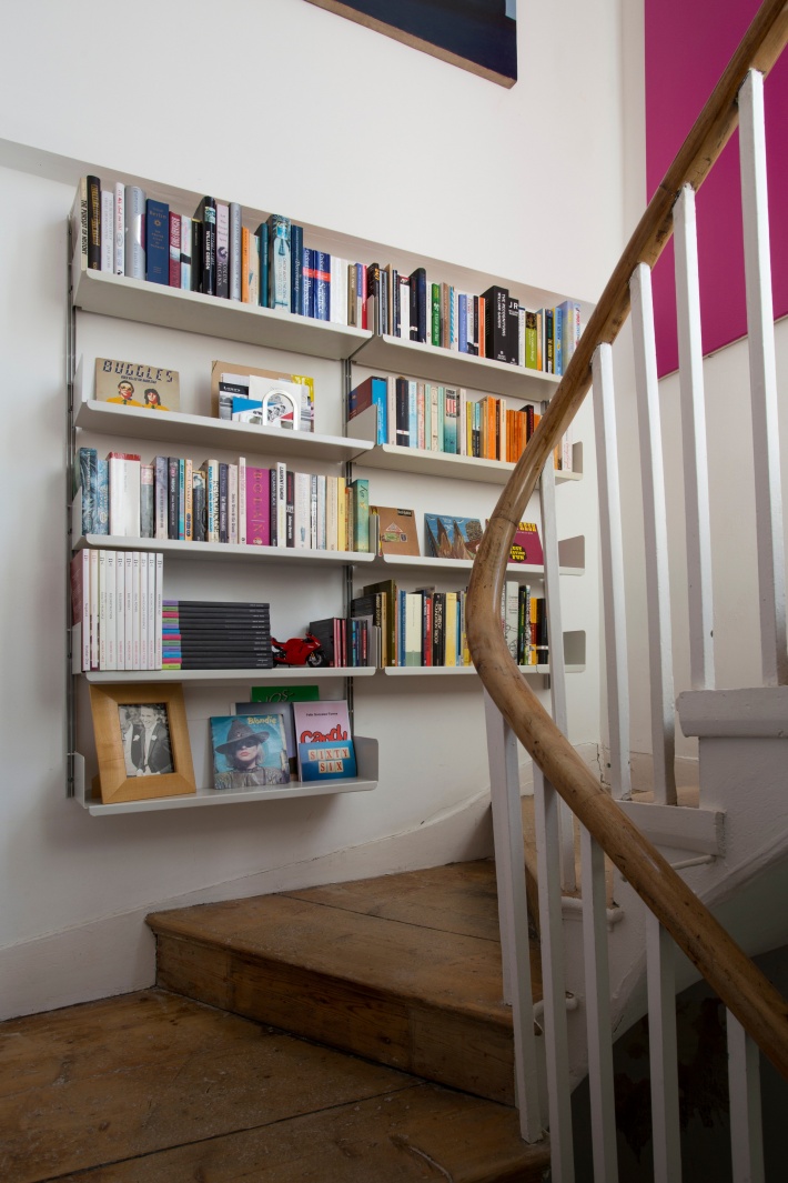 Even the recess on a half-landing can provide valuable display and storage space