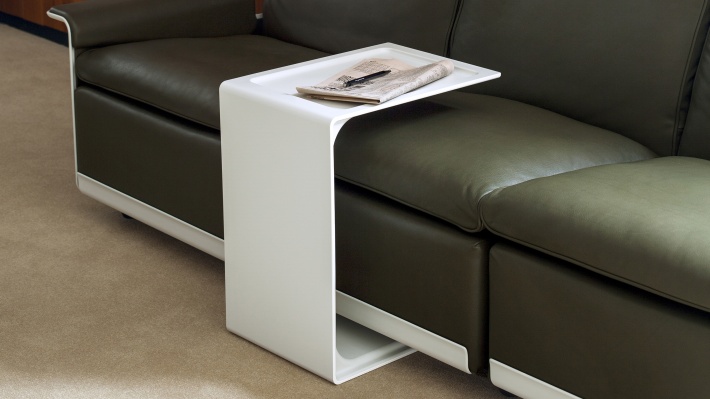 Side table 621 used as a tray for laptop or during reading in a modular sofa.