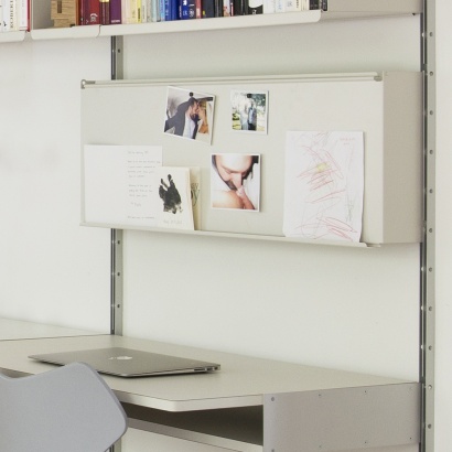 Bespoke above desk shelving, modular workstation at home. Strong 36cm metal shelves for heavy and large books. Magnetic pinboard for pictures and notes. Vitsœ 606. Designer Dieter Rams