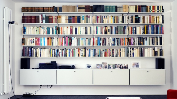 Large bookcase and floating cabinet combination, dining room or living room. Modular shelving systems. Designer Dieter Rams