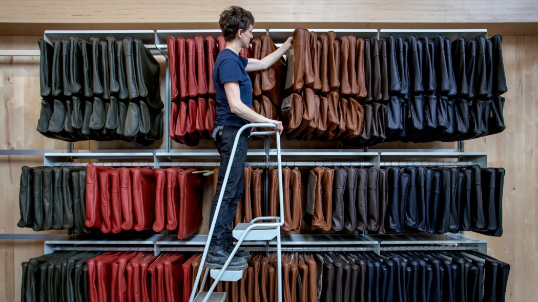 Lily hanging the 620 leather on 606 hanging rails