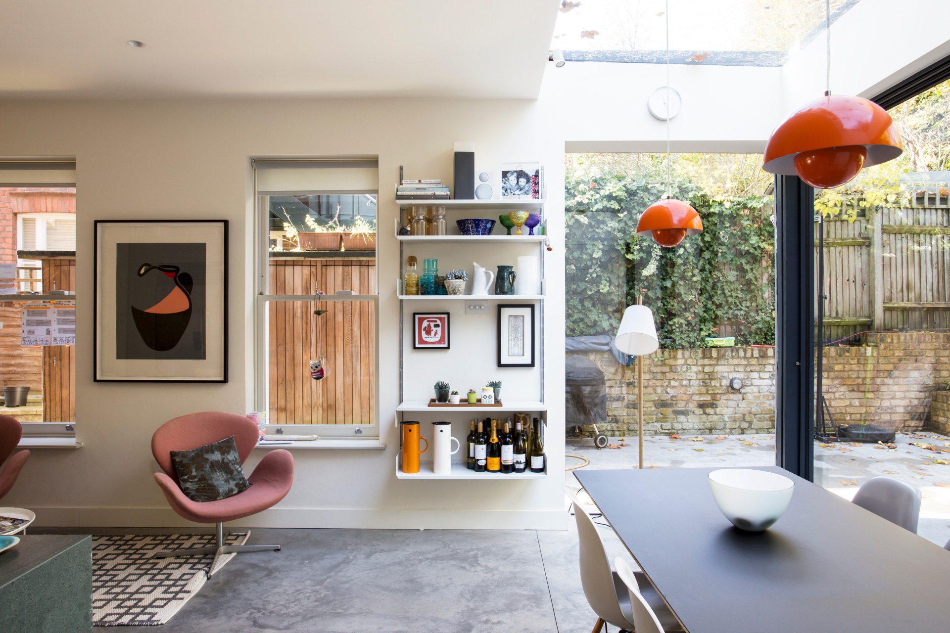 Modern Kitchen bookshelf, wall mounted open shelves for heavy kitchenware and display, recipe books. Modular Vitsœ 606 Shelving System. Designer shelves, Dieter Rams