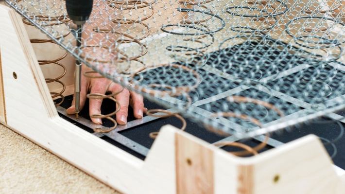 Armchair base, made of plywood, coconut, and coil-sprung interior.