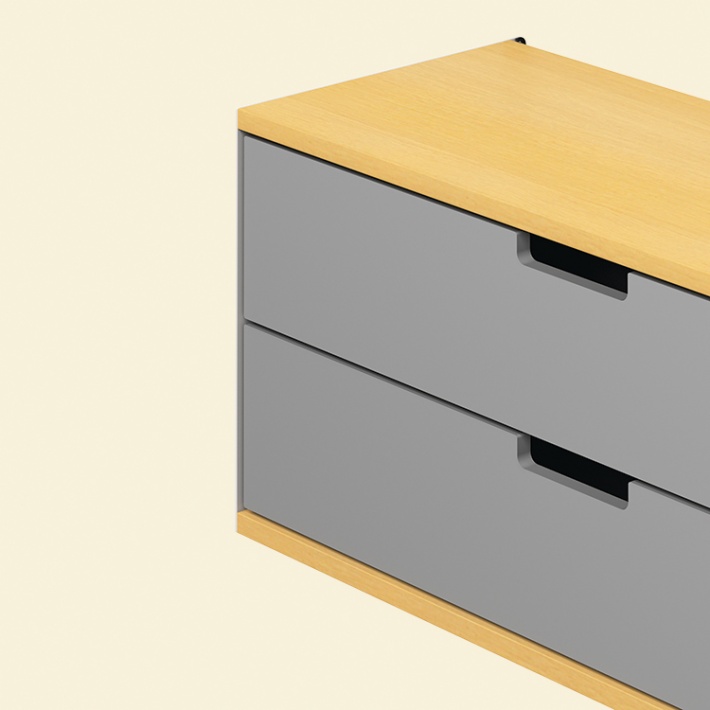 Two drawer cabinet. Vitsœ 606 shelving system, in silver and beech. Dieter Rams design