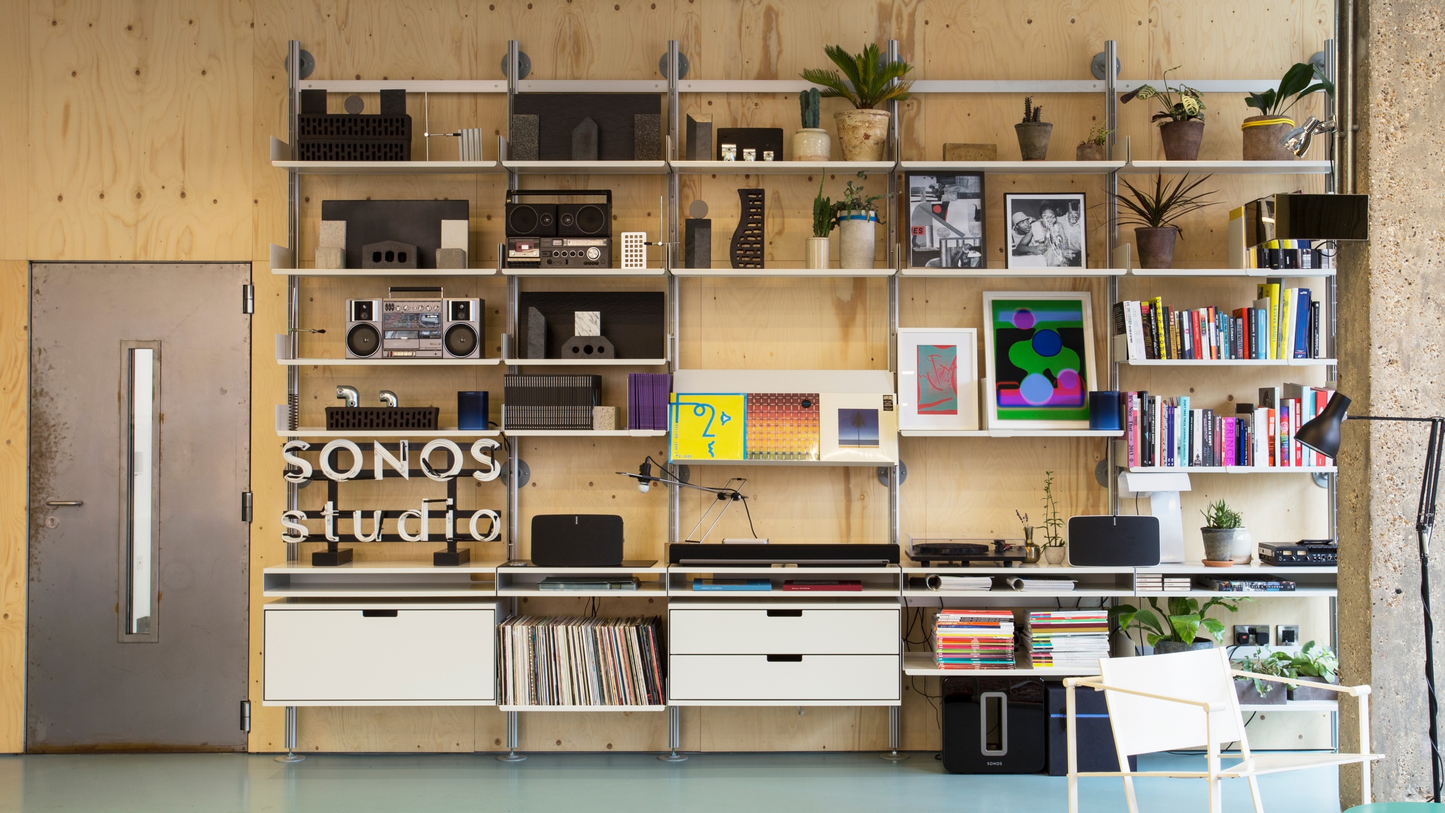 606 shelving system in off-white, with cabinets and bookshelves. Vitsœ, design Dieter Rams