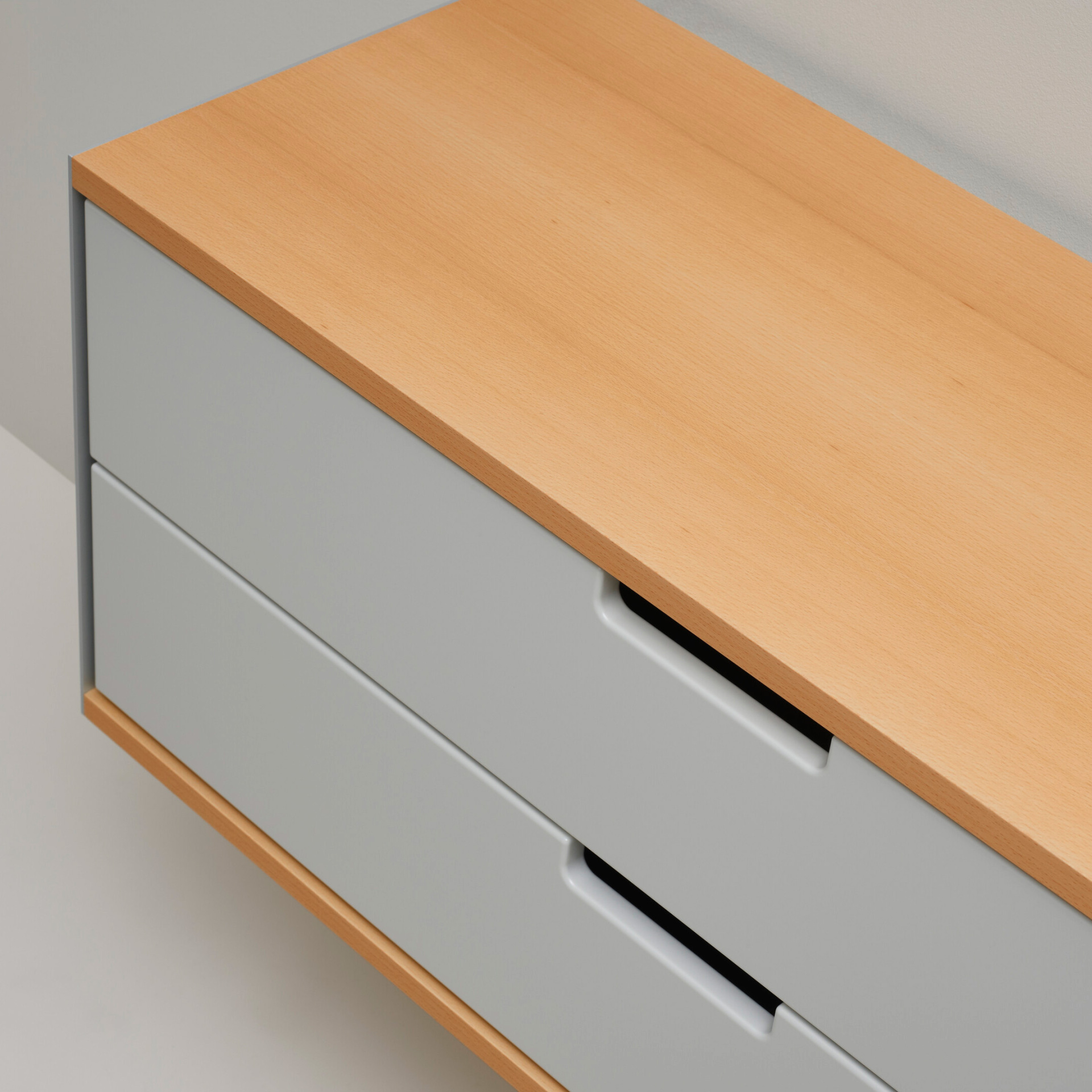 Two drawer cabinet. Vitsœ 606 shelving system, in off-white and silver. Dieter Rams design