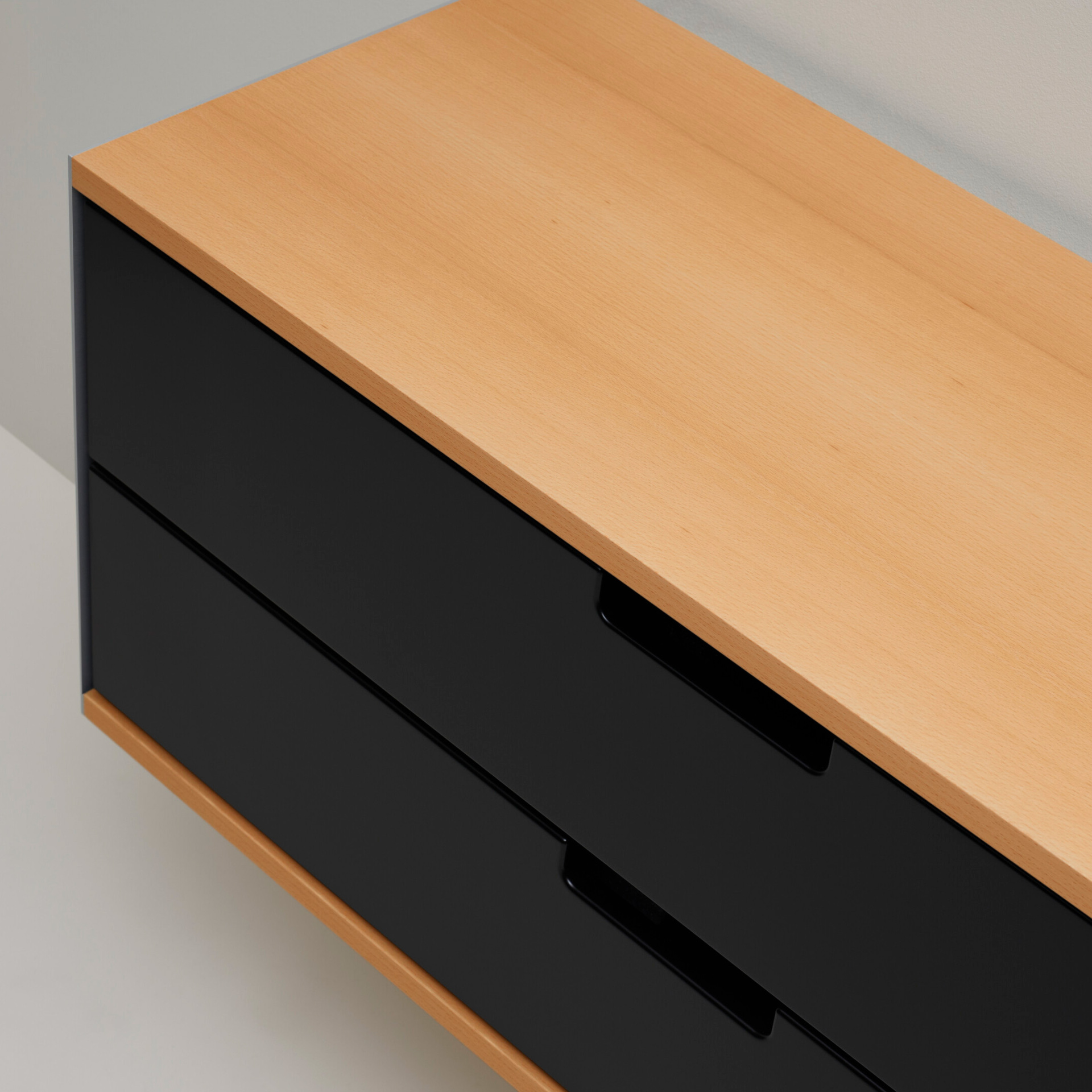 Two drawer cabinet. Vitsœ 606 shelving system, in black. Dieter Rams design