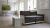 Vitsœ 620 modular sofa designed by Dieter Rams in leather upholstery with off-white shell.