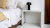 Vitsœ 621 Table designed by Dieter Rams. In off-white used as a bedside table.